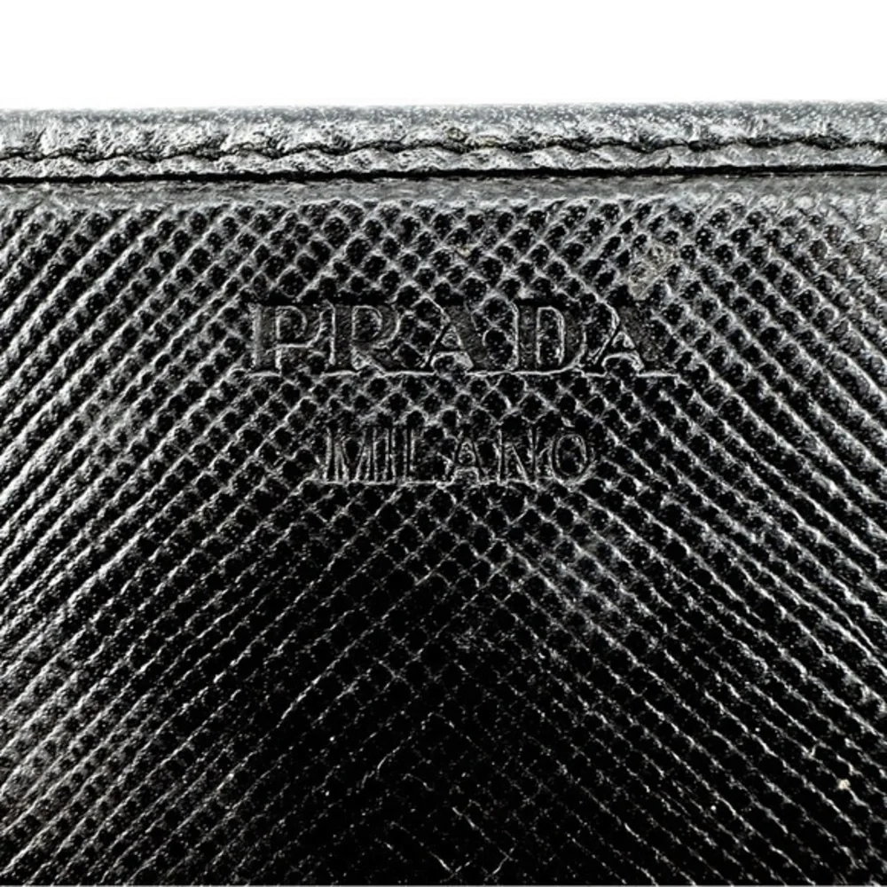 AUTHENTIC Prada wallet in black._12